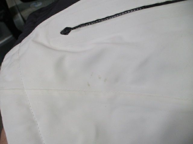 Used KJUS Lasse White Snow Jacket Size 56 /Adult Size 2XL - small spot on pocket